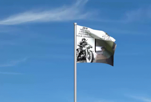 this is a large flag flying in the wind