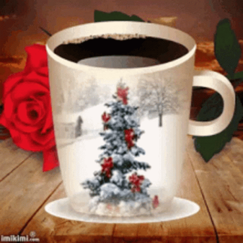 a coffee cup with a christmas tree on it