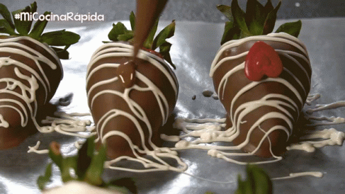 chocolate covered strawberries in a metal tray