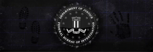 this is the logo of the department of justice on a brick wall
