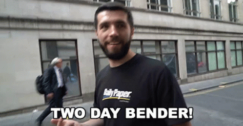 a man stands in front of a building with his hand up to his face and the words two day bender written on it
