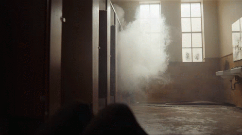 a ghostly po of smoke from inside a building