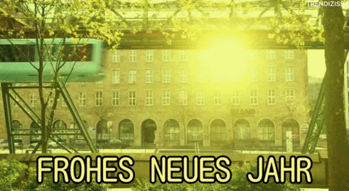 an advertit shows the words frohes neufs jahr in front of a backdrop of a building