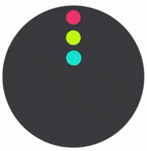 a black object with four different colored dots