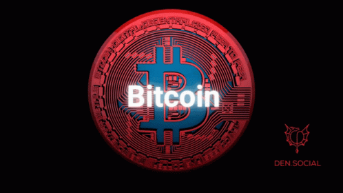 a bitcoin lit up on the dark background