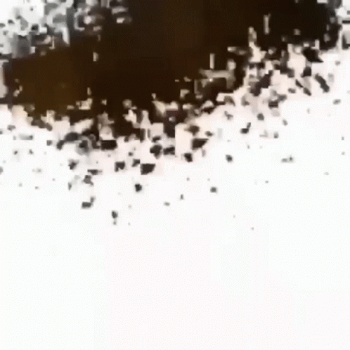 a black hole with scattered white objects in it