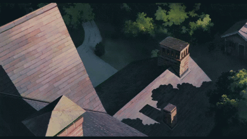 there are two roofs with two chimneys in this scene