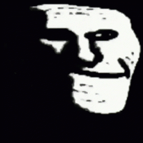 a silhouetted person with a black and white mask and words on his face