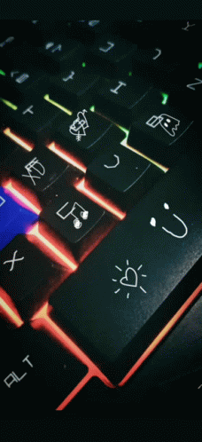 the computer keyboard has many writing on it