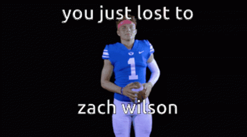 a man wearing an orange uniform with the words you just lost to zac wilson