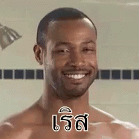 a man with a smile in a shower