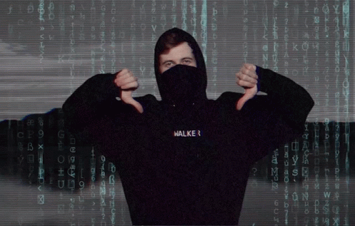 a man in a hooded sweatshirt with fingers raised