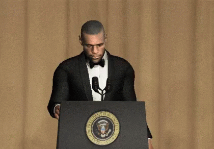 there is a man that is standing at a podium and making a speech