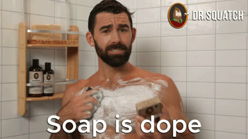 a man is making soap and shaving for his face