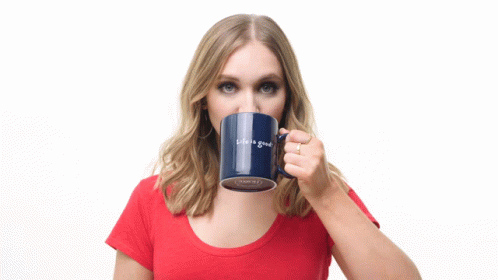 a woman holding a cup of coffee that reads'i scream on the side