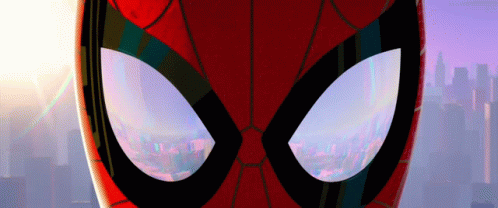 a blue spiderman suit stands in front of an alien city