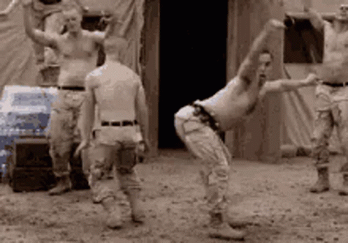 a group of military men perform yogas