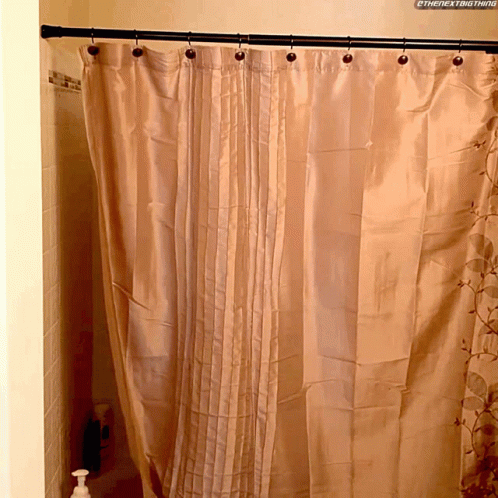 this shower curtain is a blue striped pattern