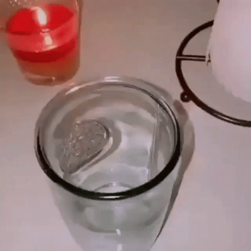 this is an image of a glass cup and container
