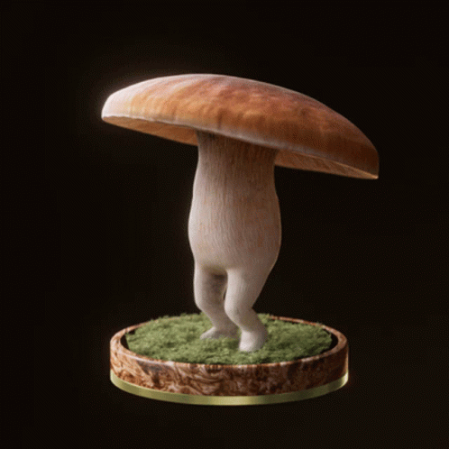 a mushroom sitting on top of a green grass covered platform