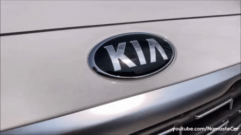 an automobile with the hood off, showing the kil logo