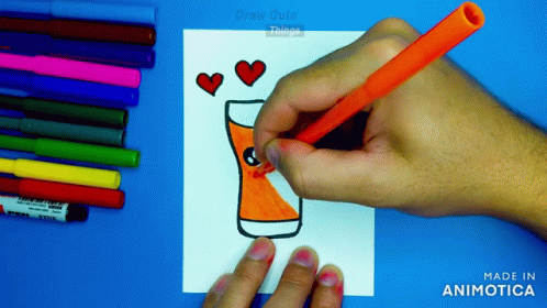 a person is drawing a picture with colored pencils