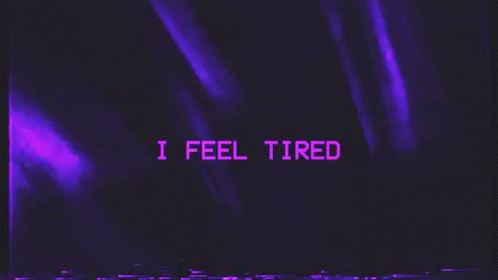 a purple lit text reads i feel tired