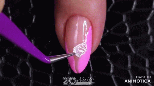 two different colored nails with a white design