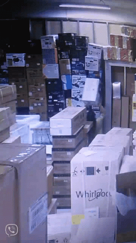 there is an image of a warehouse with boxes stacked up