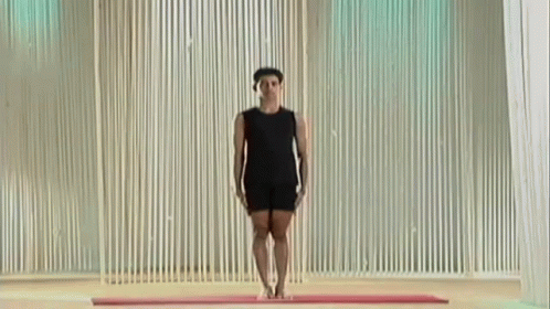 man in black t shirt and shorts on a runway