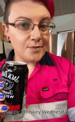 a woman in a purple shirt holding a can and a package