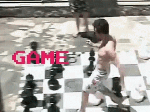 black and white po of boy playing a chess game