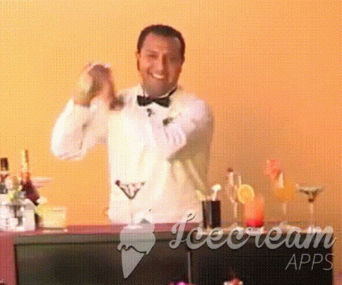 an image of a man standing up behind the bar