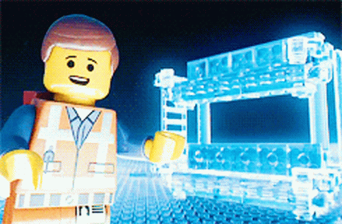 the lego man standing next to an illuminated display