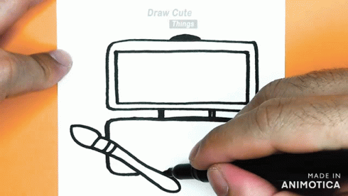 a hand holding a black marker and drawing a tv with its monitor screen