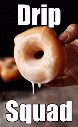 the hands are dripping soap on a donut