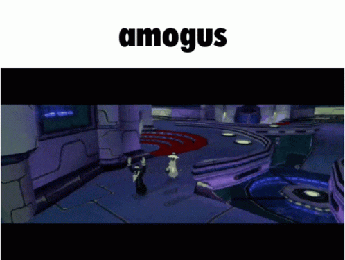 two screens that say amagus and two people are standing in the room