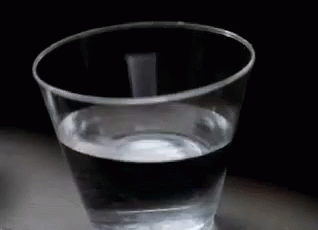a close up of a drink in a glass
