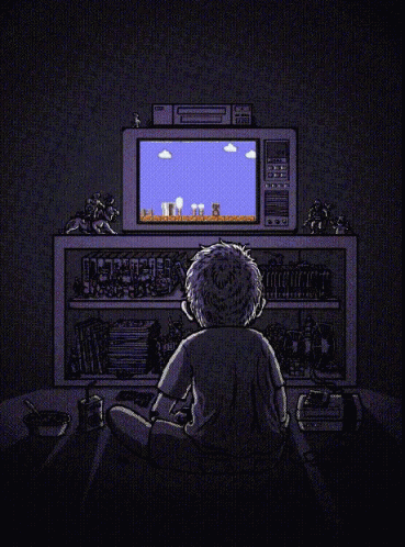 a boy sitting in front of an old tv watching television