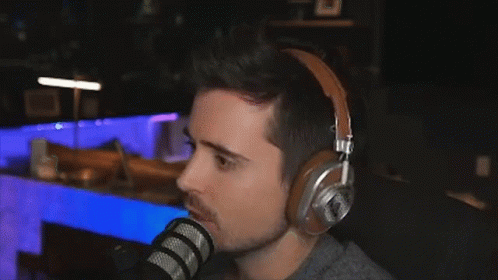 man wearing headphones on his face with microphone