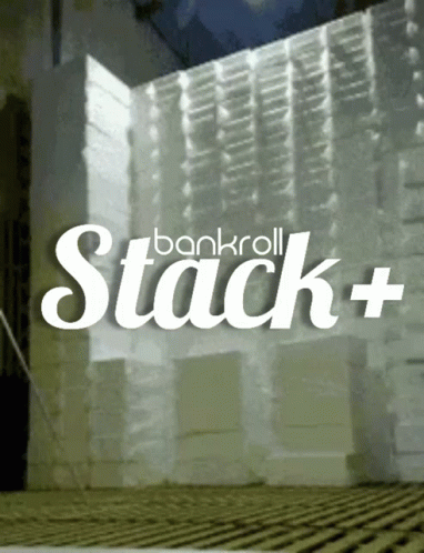 a wall covered in stacks of stacked boxes