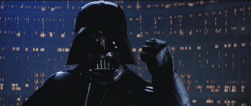 darth vader holding soing up to his face