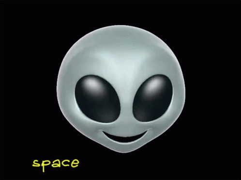 an alien head has its eyes closed in the dark