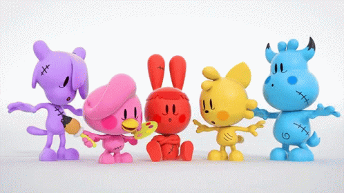 a group of toys sitting next to each other on a white surface