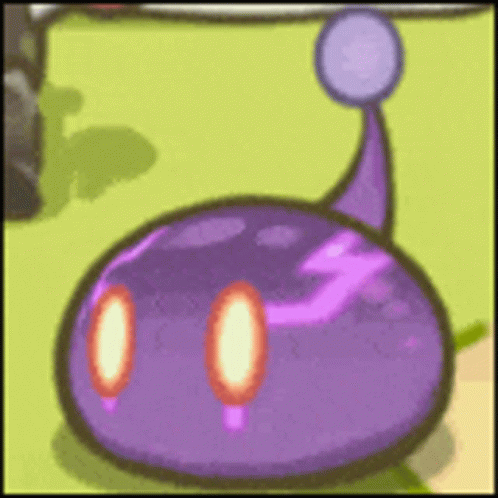 a purple object is shown in the foreground, and a green background is also visible