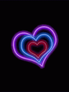 a neon pink and blue heart in a black background