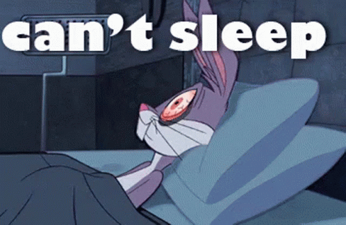a person laying in bed with an animated image that says can't sleep