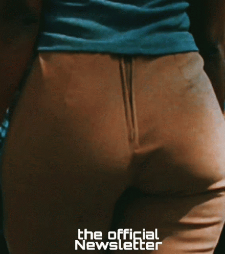 the back view of a person in blue pants