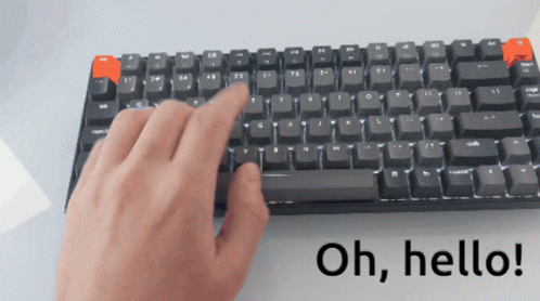 two hands that are touching the keyboard of a keyboard