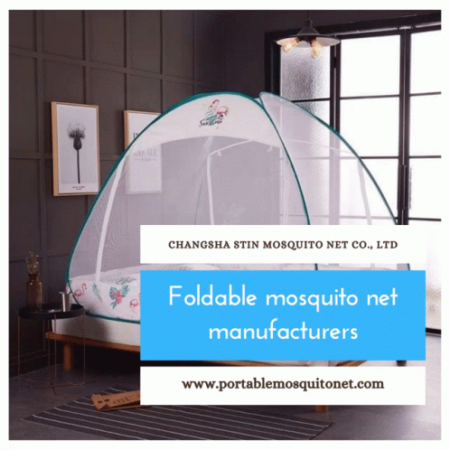 a bedroom with mosquito netting in the corner and a bed inside of it